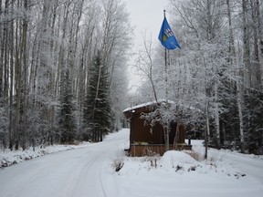 Alberta's flag flies from a checkpoint on the access road to Gregoire Lake Provincial Park on Saturday January 9, 2016.