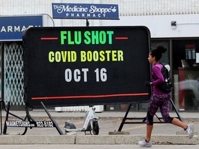 flu shot, COVID booster sign