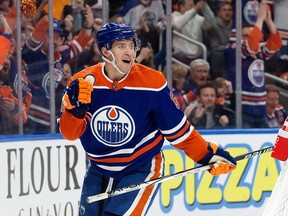 The Edmonton Oilers' Dylan Holloway (55) celebrates his goal against the Columbus Blue Jackets during third period NHL action at Rogers Place, in Edmonton on Jan. 23, 2024. The Oilers won 4-1.