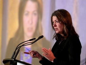 Danielle Smith at a podium
