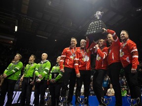 Team Canada celebrates after it defeats Team Saskatchewan at the gold medal game at the 2024 Montana's Brier at the Brandt Centre on Sunday, March 10, 2024 in Regina.