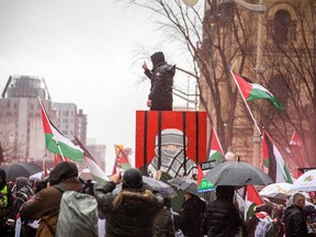 Thousands of Palestinian supporters march through the streets of Ottawa, on March 9.