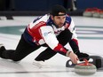 Former Minnesota Vikings football player Jared Allen practices with his curling team in 2019.