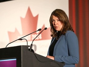 Alberta Premier Danielle Smith speaks at the Small Modular Reactor Summit 2024 at the Westin Airport in northeast Calgary on Tuesday, April 2, 2024.