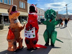 People attempt to smash the Guiness World Record for ÔLargest Gathering of People Dressed as DinosaursÕ in Drumheller, Alta. on Saturday April 27, 2024. Photo supplied by Travel Drumheller.