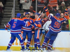 Edmonton Oilers Evander Kane (91) celebrates his goal with teammates against the Colorado Avalanche during second period NHL action on Friday, April 5, 2024 in Edmonton.     Greg Southam-Postmedia