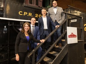 lberta Premier Danielle Smith, left, Transportation and Economic Corridors Minister Devin Dreeshen, Calgary Airport Authority CEO Chris Dinsdale, and Rail for Alberta Society president Justin Simaluk
