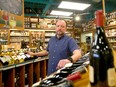 Andrew Ferguson of Kensington Wine Market poses in his northwest Calgary store Thursday, May 9, 2024.