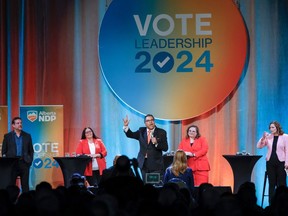 Alberta NDP leadership candidate Naheed Nenshi, centre, makes an closing statement as fellow candidates, left to right, Gil McGowan, Jodi Calahoo Stonehouse, Sarah Hoffman, and Kathleen Ganley look on during a leadership debate in Calgary on Saturday.