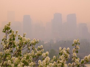 The downtown Calgary skyline was obscured by thick forest fire smoke on Tuesday, May 16, 2023.