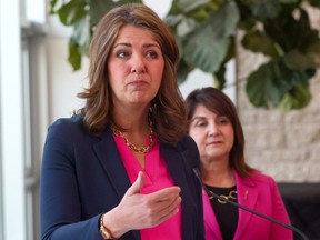 Premier Danielle Smith and Minister of Health Adriana LaGrange speak at a news conference at the Foothills Medical Centre in Calgary on Friday, May 3, 2024.