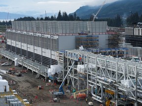 Cooling towers used to dissipate heat generated when natural gas is converted into liquefied natural gas are seen under construction at the LNG Canada export terminal in Kitimat, B.C. on Sept. 28, 2022.