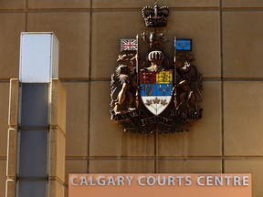 Exterior signage is shown at the Calgary Courts Centre in downtown Calgary on Monday, March 11, 2024.