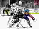 Edmonton Oilers forward Mattias Janmark (13) battles the Dallas Stars' Miro Heiskanen (4) at Rogers Place, in Edmonton on May 29, 2024. The Oilers won 5-2.