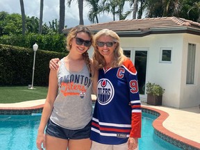 Cristy Cunningham and her daughter, Ana, donning Oilers gear in Florida ahead of the Oilers' Stanley Cup Final matchup against the Florida Panthers.