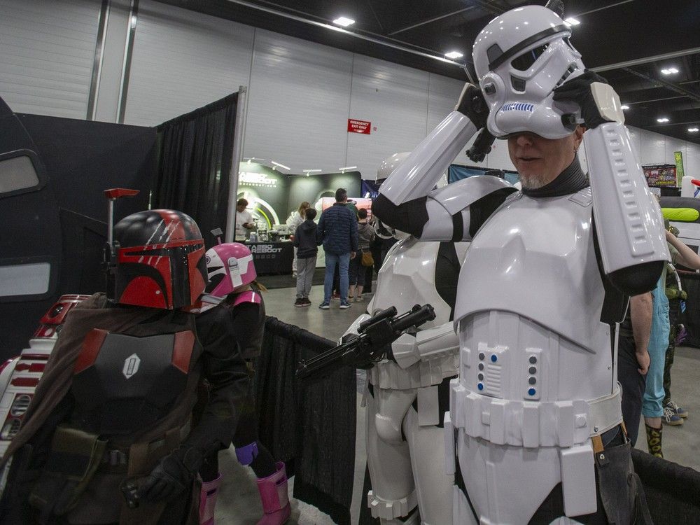 Francois Deslauriers straightens his stormtrooper helmet at Game Con Canada, the country's only internationally recognized ovideo game convention on Sunday, June 16, 2024 in Edmonton.  Greg Southam-Postmedia