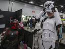Francois Deslauriers straightens his stormtrooper helmet at Game Con Canada, the country's only internationally recognized ovideo game convention on Sunday, June 16, 2024 in Edmonton. Greg Southam-Postmedia