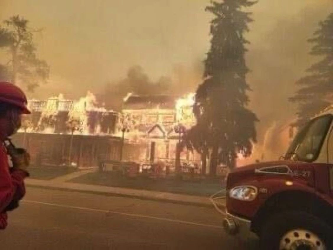 Politics tamfitronics An image circulating on social media shows Maligne Lodge in Jasper burning after flames from a large wildfire reached the town on Wednesday, July 25, 2024.