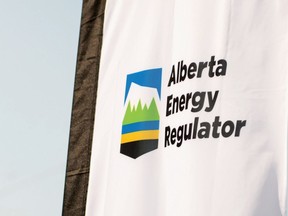 Yellowhead County in northern Alberta says a fire that prompted the closure of a major highway east of Edmonton involved a gas metering station. The Alberta Energy Regulator logo is seen on a flag at the opening of the regulator's office in Calgary in an undated handout photo.
