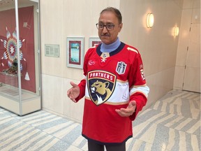 mayor amarjeet sohi wearing a florida panthers jersey