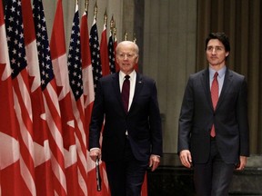 U.S. President Joe Biden and Prime Minister Justin Trudeau are pictured in Ottawa in 2023, happier times for both.