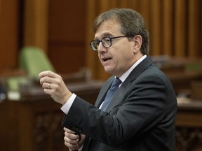 Eleven clean energy projects, most of which are based in Alberta, have been selected to receive a total of $11 million in federal funding. Energy and Natural Resources Minister Jonathan Wilkinson rises during Question Period, Monday, June 17, 2024 in Ottawa.