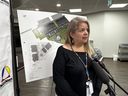 NiGiNan Housing Ventures CEO Keri Cardinal Schulte answers questions from reporters following an announcement on Monday, Nov. 4, 2024, that NiGiNan received funding for two new buildings to expand its services.