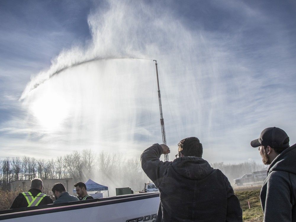 Alberta-made 100-foot sprinkler tower heralded as the latest wildfire fighting tool