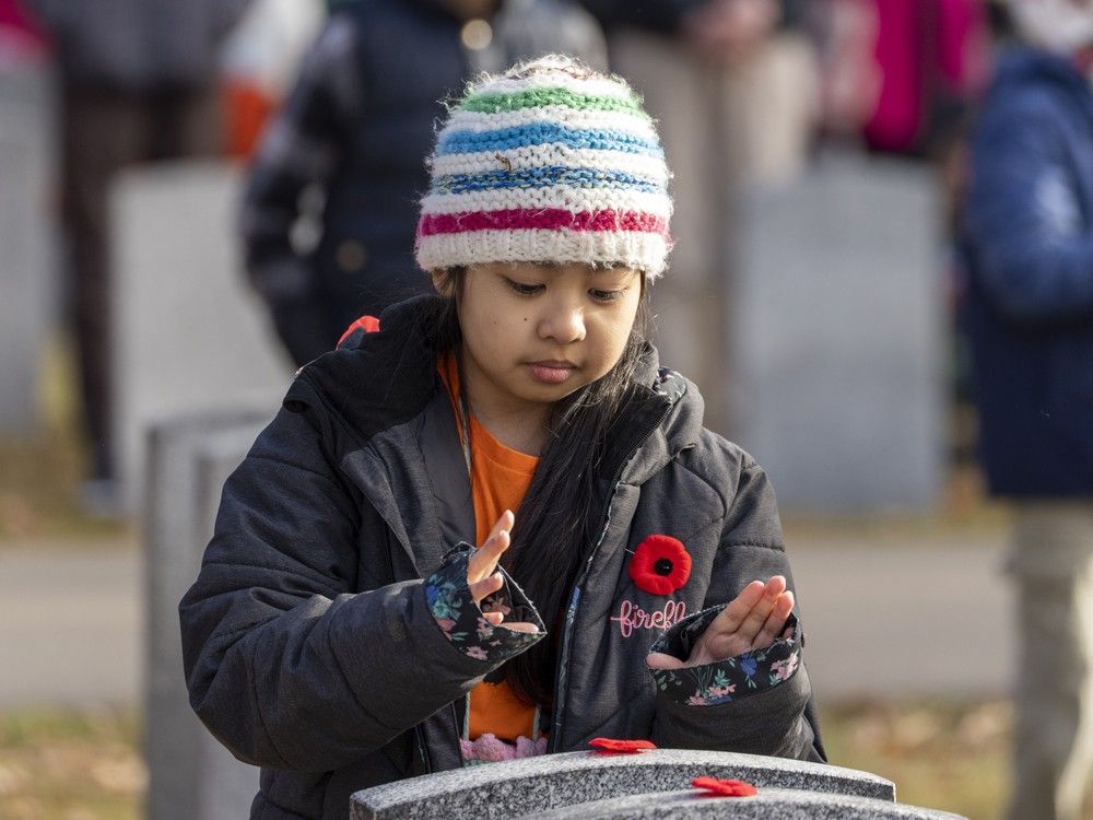 Photos Edmonton students lay poppies for No Stone Left Alone ahead of