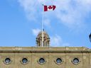 The Maple Leaf flutters in the wind above the Alberta legislature building on Tuesday, Nov. 5, 2024, in Edmonton.