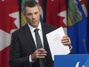 Alberta Finance Minister Nate Horner provides a fiscal update at the Alberta legislature on Aug. 29, 2024.