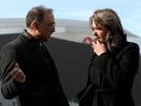 Mayor Amarjeet Sohi and Premier Danielle Smith chat following a press conference to officially announce a funding agreement for a new $250 million OEG event fan park outside Rogers Place, in downtown Edmonton Friday March 7, 2025. Photo by David Bloom