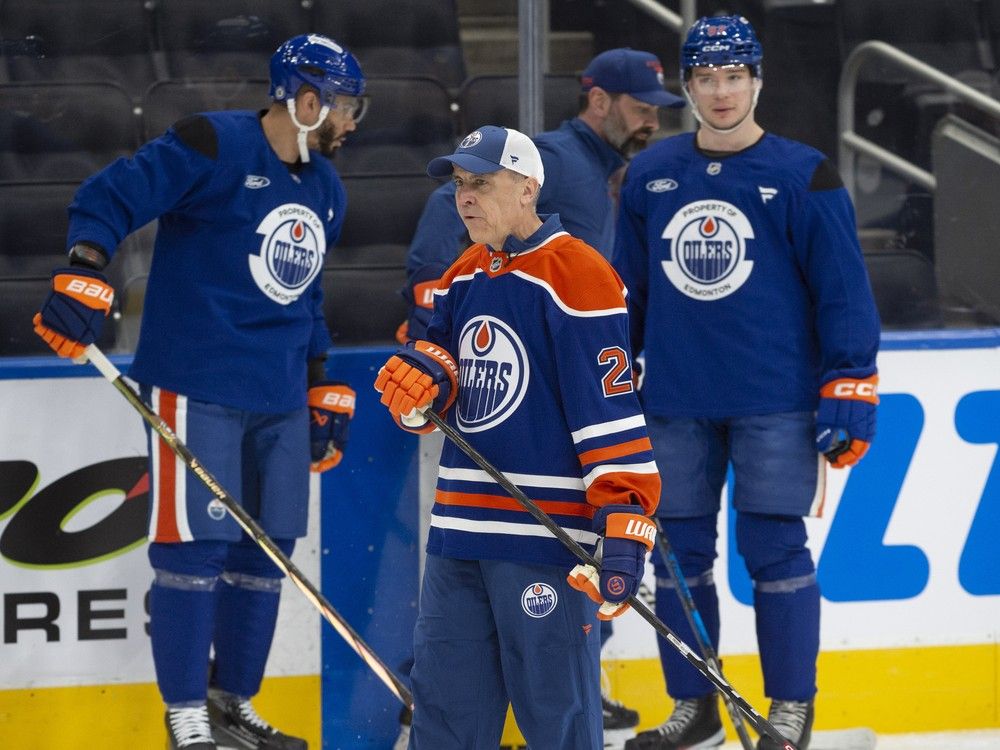 Mark Carney skating with the Edmonton Oilers hockey team