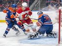 Calvin Pickard #30 of the Edmonton Oilers saves the Calgary Flames’ 76 crash on the first phase of the game at Rogers Place on March 29, 2025.
