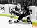Edmonton Oilers defensive player Troy Stecher sent Los Angeles Kings to the board of directors during the second phase of the NHL hockey game in Los Angeles on Saturday, April 5, 2025.