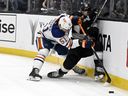 Edmonton Oilers defensive player Troy Stecher sent Los Angeles Kings to the board of directors during the second phase of the NHL hockey game in Los Angeles on Saturday, April 5, 2025.