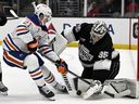 Los Angeles Kings goalkeeper Darcy Kuemper stopped the Edmonton Oilers Center's Trent Frederic's shot in the first phase of the NHL hockey game in Los Angeles on Saturday, April 5, 2025.