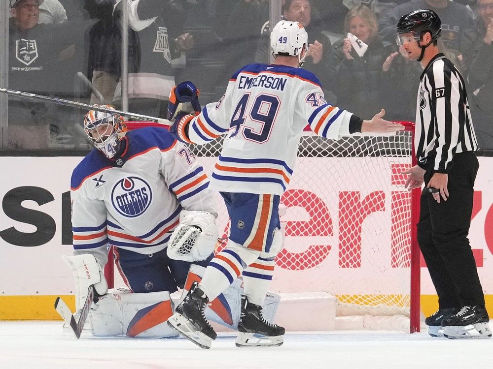 The Edmonton Oilers defense, Ty Emberson, attracts a line player after the Los Angeles Kings center, Anze Kopitar, scored as goalkeeper Stuart Skinner is in goal during the third period in game 2 of a series of first round of the NHL on Wednesday, April 23, 2025, in Los Angeles. 