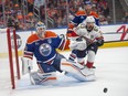 Goalie Calvin Pickard (30) of the Edmonton Oilers makes a save on Brad Marchant (63) the Florida Panthers in game six of the Stanley Cup final