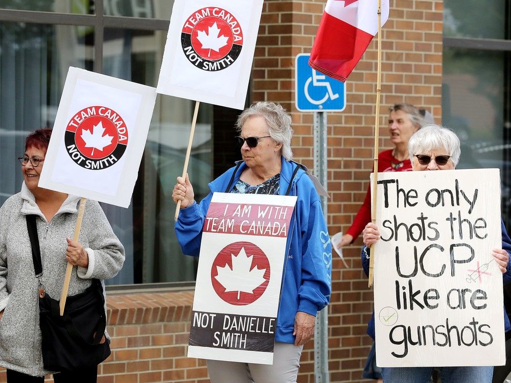  Protesters rally outside an Alberta Next Panel in-person town hall, in Edmonton Thursday Aug. 14, 2025.