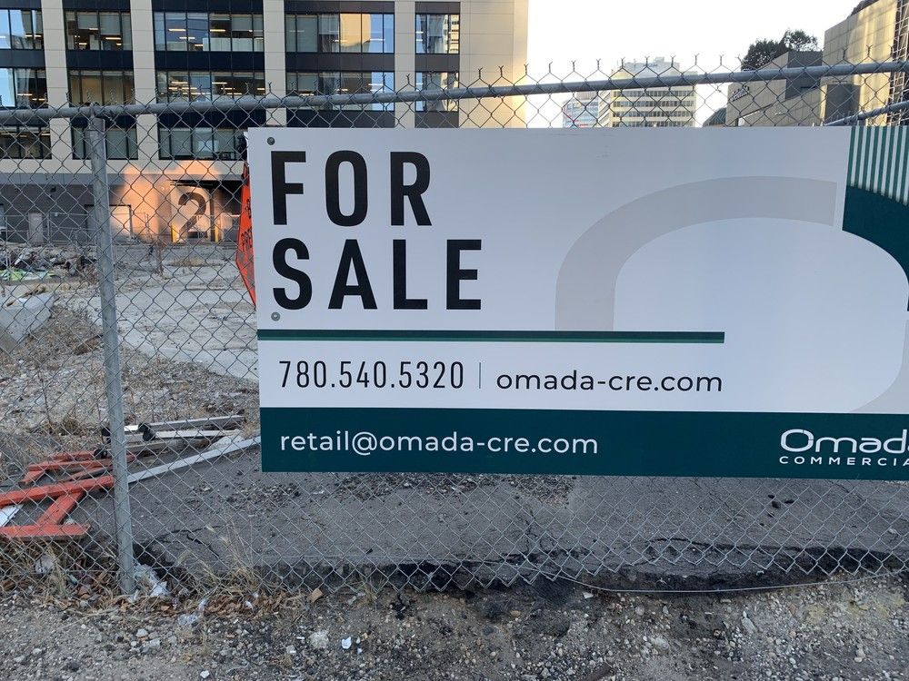 The site of the old Bank of Montreal building in Downtown Edmonton is now for sale with a sign posted on the site on Nov. 24, 2025. The list price is $6 million.