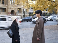 Go Youn-jung, Kim Seon-ho in Olympic Plaza in Calgary in a scene from the Netflix Korean series Can This Love Be Translated. Courtesy, Netflix.