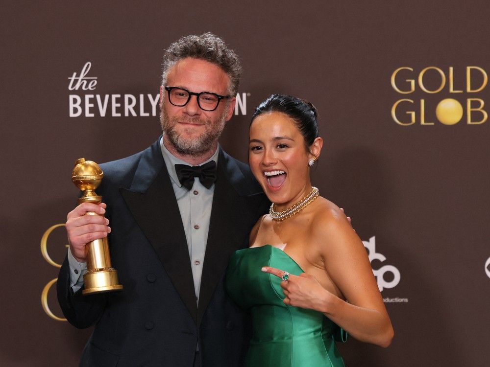 Actor, writer and producer Seth Rogen with actress Chase Sui .