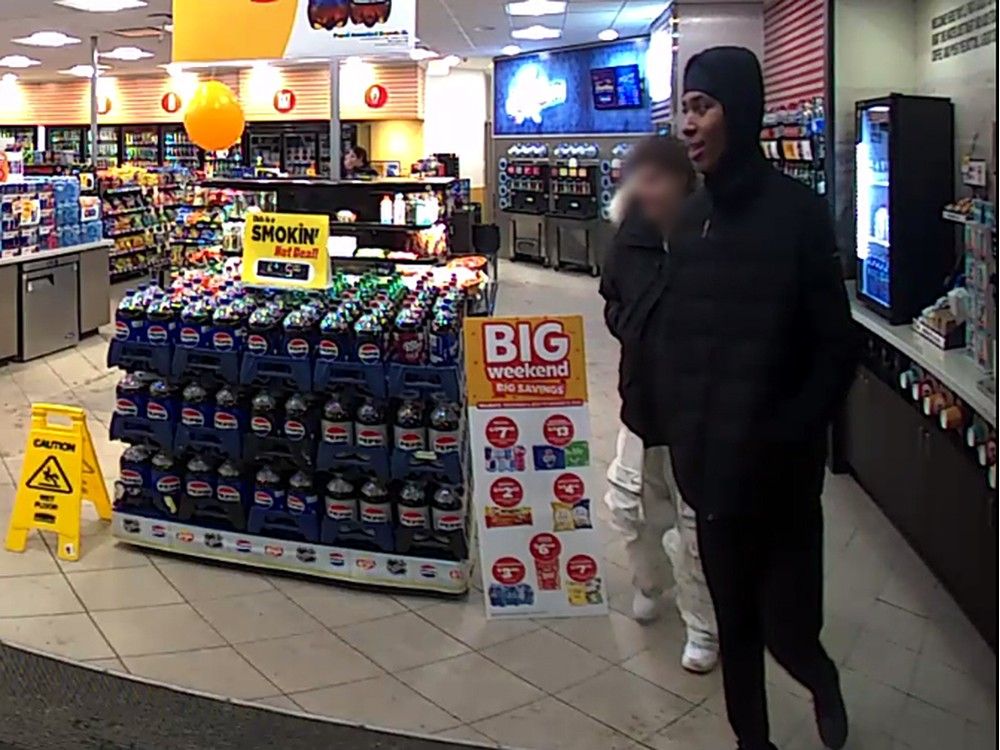 Edmonton police arrest two, search for third suspect linked to December carjackings