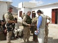Maj.-Gen. David Allison Fraser (retired) Regional Command South Commander visits troops stationed in Gumbad, Afghanistan during his visit to the region in 2006.