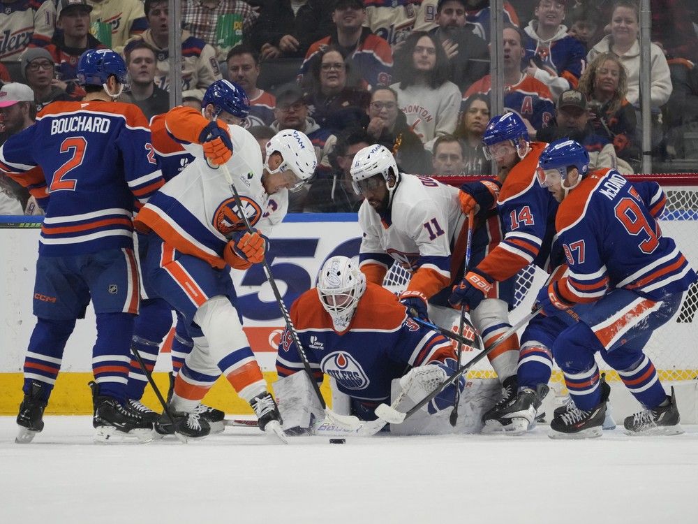 Goalies steal the show as Islanders visit Oilers