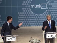Liberal Leader Justin Trudeau, left, and Conservative Leader Stephen Harper trade words during the Munk Debate on foreign affairs in Toronto on Sept. 28, 2015.
