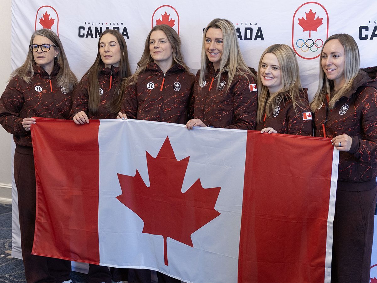 Members of the Canadian women's Olympic curling team, skipped by Rachel Homan (right), pose for photos at an event at Hotel Halifax on Monday, Dec. 1, 2025. Ryan Taplin - The Chronicle Herald