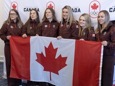 Members of the Canadian women's Olympic curling team, skipped by Rachel Homan (right), pose for photos at an event at Hotel Halifax on Monday, Dec. 1, 2025. Ryan Taplin - The Chronicle Herald
