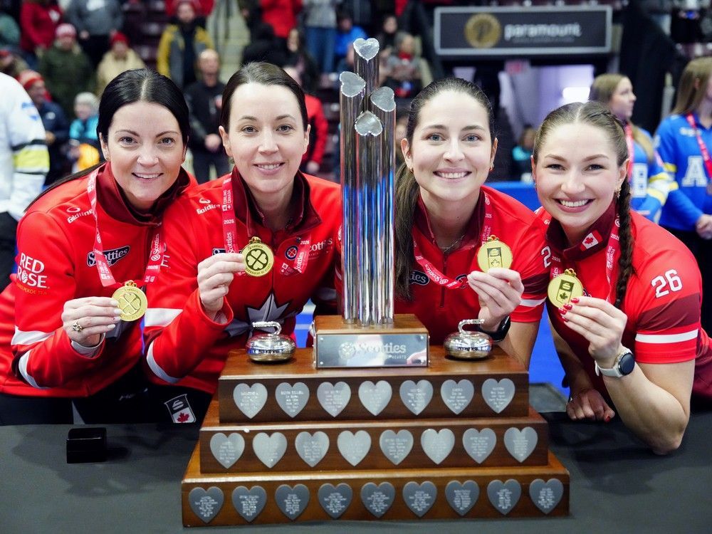 Team Canada, from left to right, skip Kerri Einarson, third Val Sweeting, second Shannon Birchard and lead Karlee Burgess celebrate after they won the Scotties Tournament of Hearts curling finals in Mississauga, Ont., Sunday, Feb. 1, 2026.